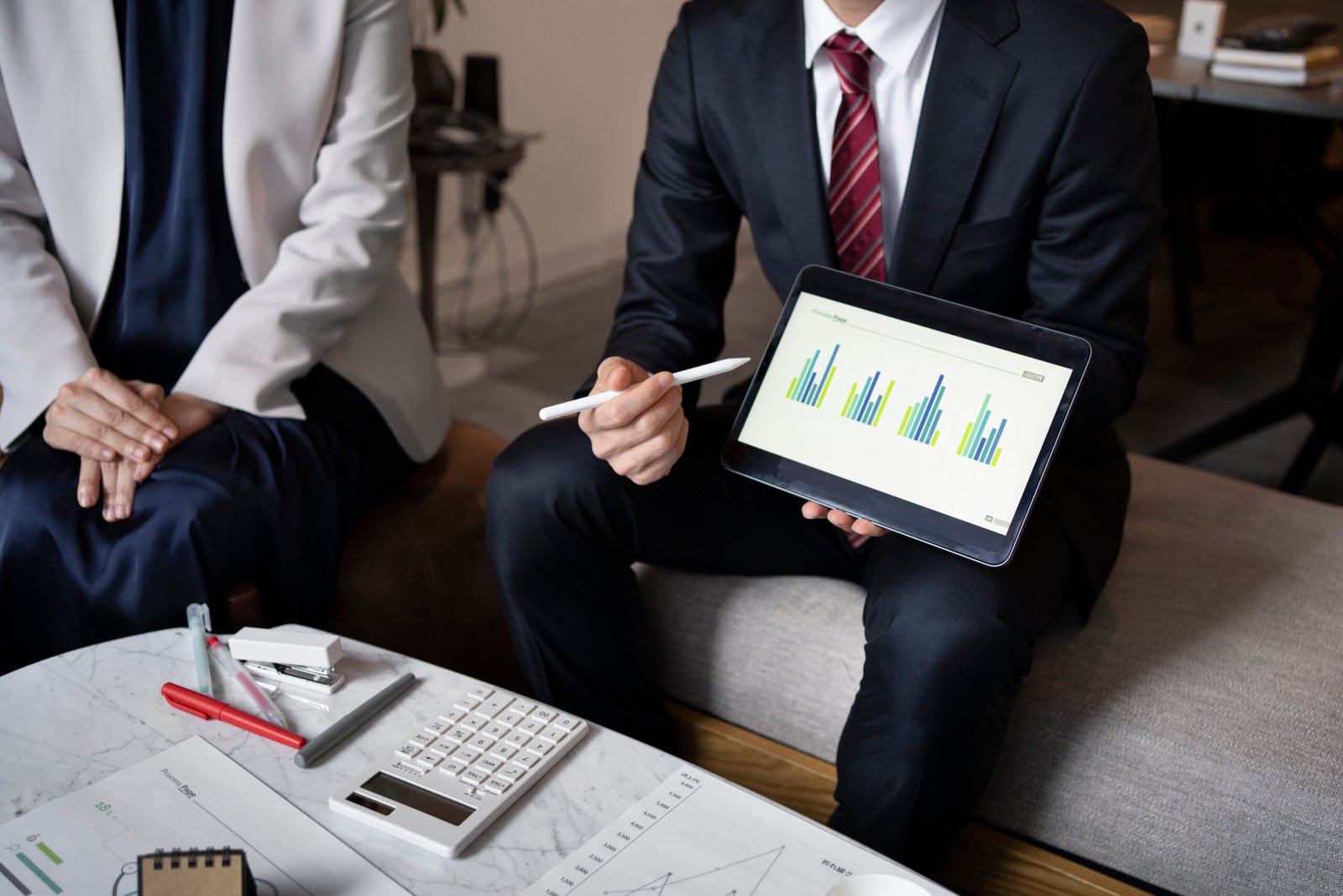 business-people-working-with-ipad-high-angle